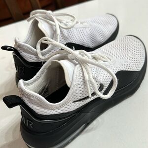 Women’s white size 7 Nike Air tennis shoes, like new, black soles